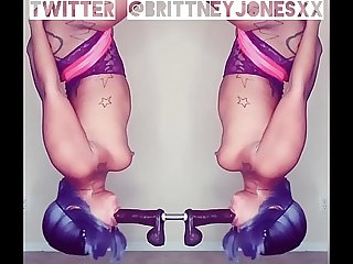 Brittney Jones playing on her fuck swing.